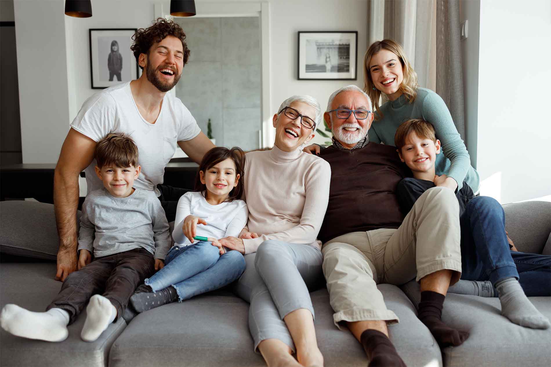 Family gathered together on the couch